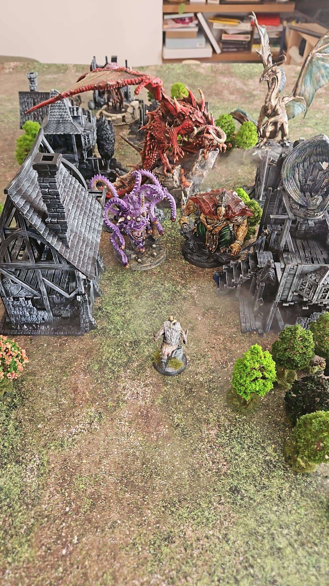 A dragon stalking a miniature village street